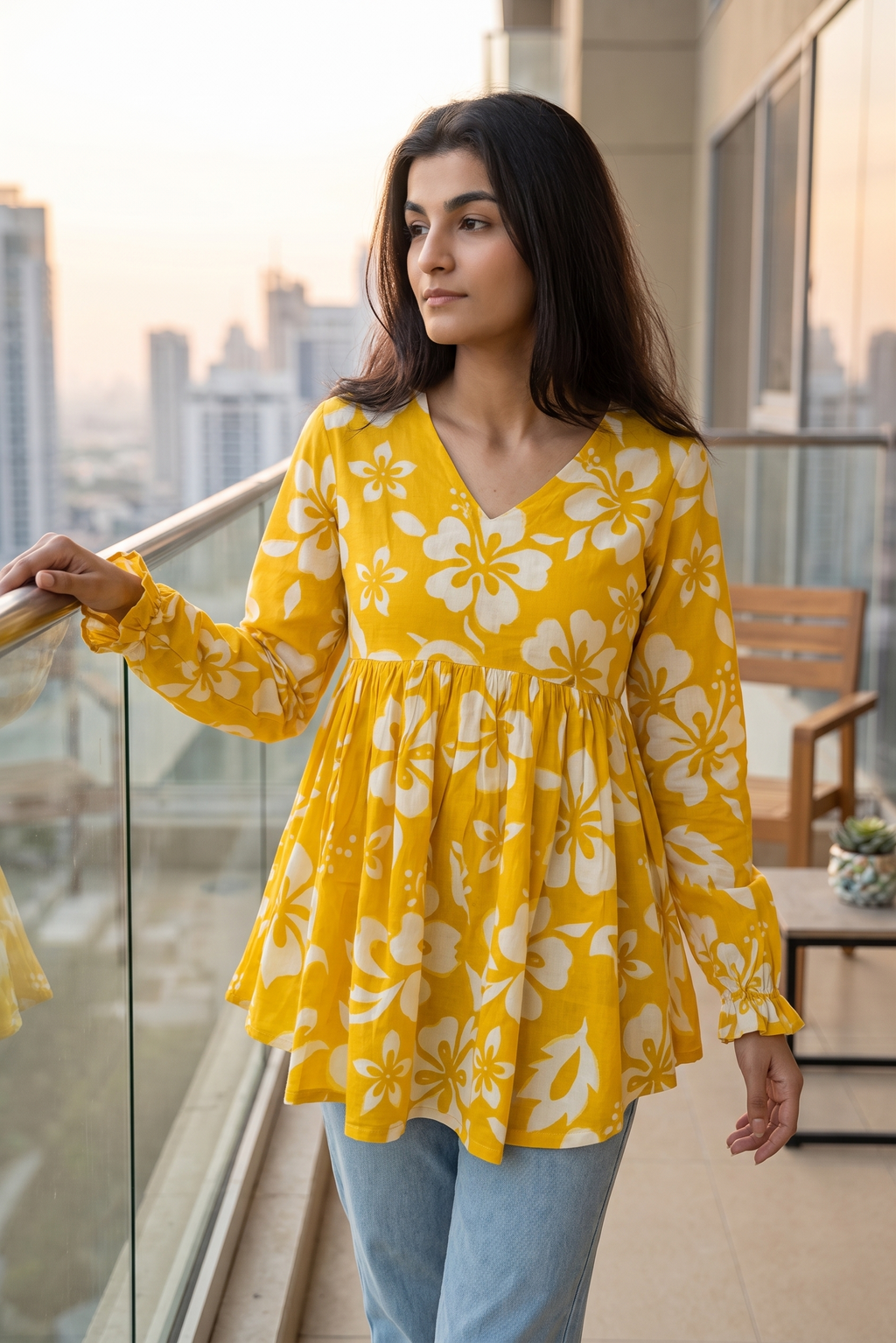 Trendy yellow floral printed peplum top with full sleeves