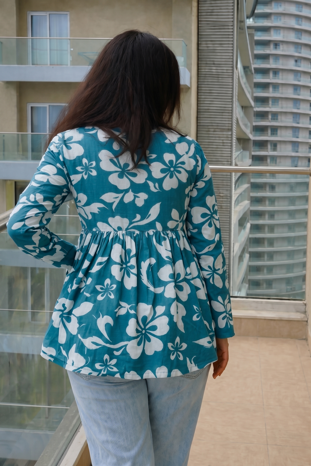 Trendy yellow floral printed peplum top with full sleeves