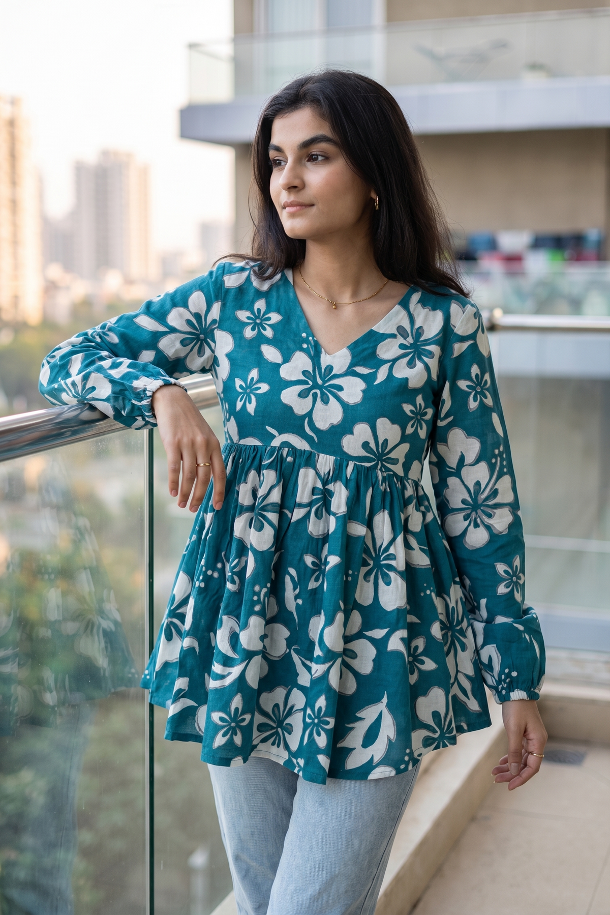 Trendy yellow floral printed peplum top with full sleeves